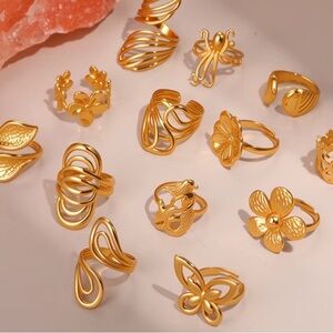 Bundle of rings. Gold Floral & Sculptural Stackable Rings Set — Gold Tone